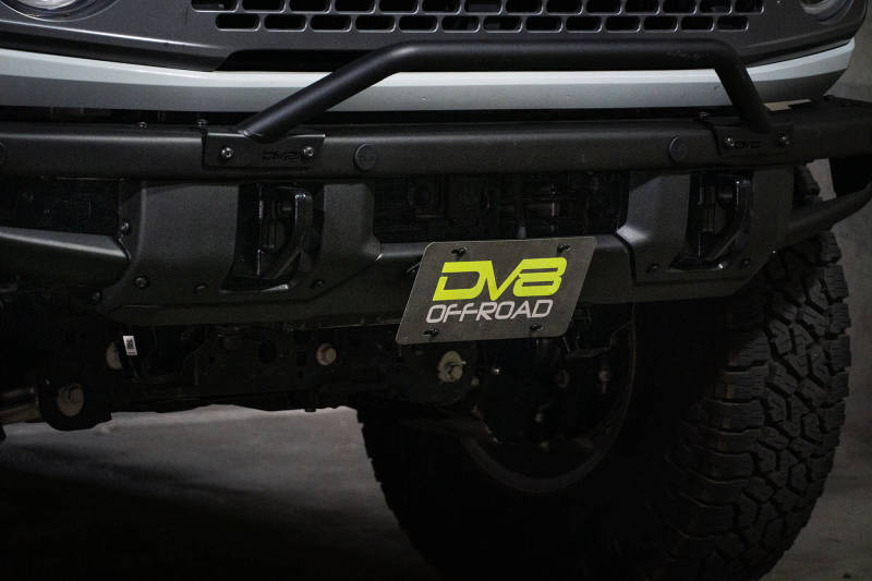 DV8 Offroad 21-22 Ford Bronco Factory Front Bumper License Relocation Bracket - Front