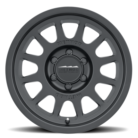 Method MR703 17x8.5 +25mm Offset 6x135 87mm CB Matte Black Wheel