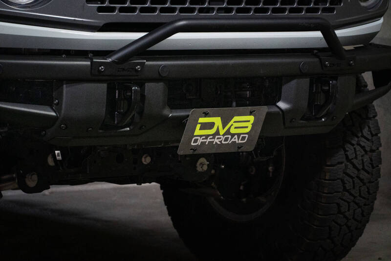 DV8 Offroad 21-22 Ford Bronco Factory Front Bumper License Relocation Bracket - Front
